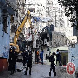"حماية" في تحد جديد للإرادة الدولية، سلطات الاحتلال شرعت منذ ساعات الصباح بهدم"20" محل تجاري في مدينة القدس المحتلة